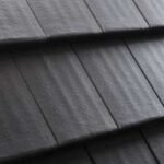 Granito spalvos betoninės čerpės Benders Carisma, stogo danga iš arti.