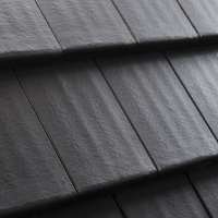 Granito spalvos betoninės čerpės Benders Carisma, stogo danga iš arti.