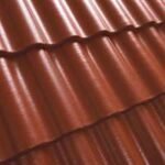 Raudonos spalvos Benders Palema betoninės čerpės stogo danga, tekstūra.