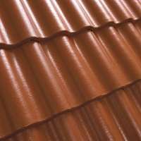 Rudos spalvos betoninės čerpės stogo danga, iš arti. Benders Palema CANDOR.